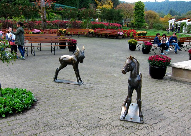 Kids can "ride" these colts, found in the Piazza Square beyond the Italian Garden