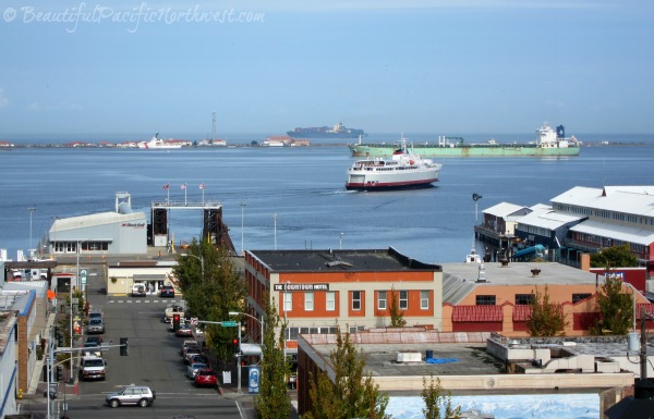 Laurel Street, in Port Angeles Washington, which ends in the ferry terminal. The Coho Ferry has just left the Port Angeles dock headed to Victoria BC.